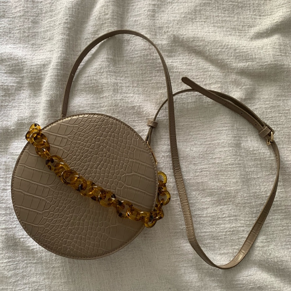 Taupe round crossbody bag
